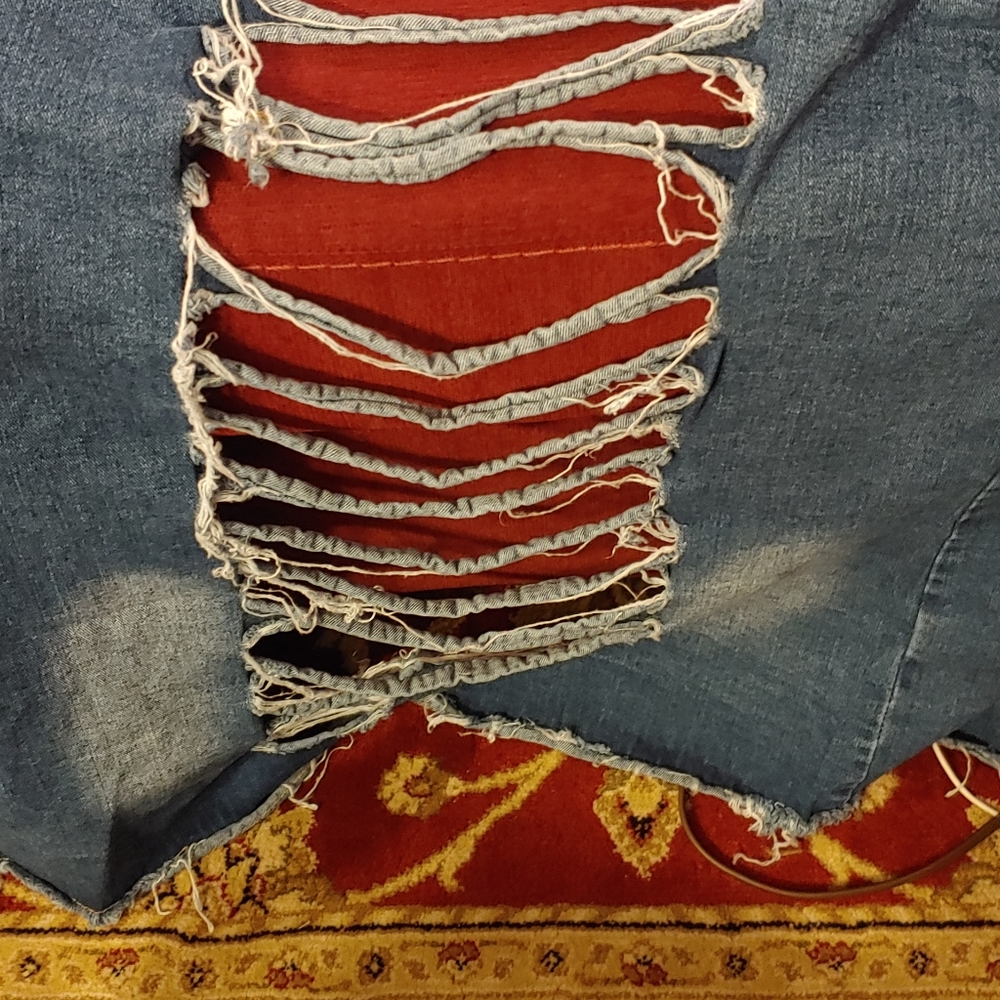 Distressed denim jacket